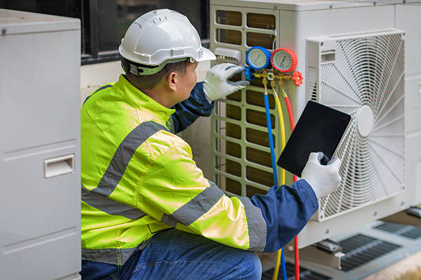 Professional Air Conditioning Repair technician working in Hastings, MI